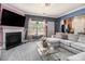 Open-concept living room with stylish seating, fireplace, and easy access to the kitchen at 2780 Lakeview Walk, Decatur, GA 30035
