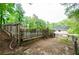 Spacious backyard featuring a weathered fence and view of the home at 2923 Bicentennial Dr, Stone Mountain, GA 30087