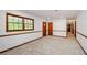 Spacious basement with lots of natural light and a neutral carpet at 2923 Bicentennial Dr, Stone Mountain, GA 30087