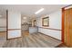 Open-concept with breakfast bar and hardwood floors leading to the updated kitchen at 2923 Bicentennial Dr, Stone Mountain, GA 30087