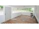 Sunroom with natural light and an entry door at 2923 Bicentennial Dr, Stone Mountain, GA 30087