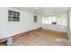 Light-filled sunroom with wood floors and windows at 2923 Bicentennial Dr, Stone Mountain, GA 30087
