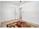 This bedroom has light wood floors and offers a spacious layout with convenient access to other areas at 4020 Ester Sw Dr, Atlanta, GA 30331