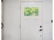 White interior door with a small window at 4020 Ester Sw Dr, Atlanta, GA 30331