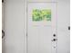 Stylish door with square window allows natural light to illuminate the interior at 4020 Ester Sw Dr, Atlanta, GA 30331