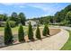 Charming home showcasing a well-maintained front yard and lush landscaping at 4020 Ester Sw Dr, Atlanta, GA 30331