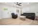 Inviting living room featuring sleek floors and natural light at 4020 Ester Sw Dr, Atlanta, GA 30331