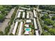 An aerial perspective reveals apartment buildings, lush trees, and parking areas, forming an inviting residential community at 6980 Roswell Rd # P6, Atlanta, GA 30328