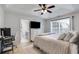 Spacious bedroom with vaulted ceilings, ceiling fan, and attached bathroom offers lots of natural light at 102 Natalie Ct, Dallas, GA 30157