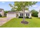 Charming home with a well-kept lawn, attached garage, and classic black shutters at 102 Natalie Ct, Dallas, GA 30157