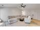 Cozy living room with lots of seating, neutral tones, and a ceiling fan at 102 Natalie Ct, Dallas, GA 30157