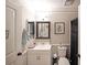 Cozy bathroom featuring white cabinets, neutral wall color, and essential toiletries at 1313 Old Countryside Cir, Stone Mountain, GA 30083
