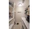 Well-organized laundry room equipped with shelving, modern washer/dryer, and storage baskets at 1313 Old Countryside Cir, Stone Mountain, GA 30083