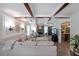 Spacious living room with coffered ceilings, a cozy fireplace, and stylish decor throughout at 1313 Old Countryside Cir, Stone Mountain, GA 30083
