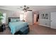 Spacious main bedroom with ceiling fan, and walk-in closet at 1313 Old Countryside Cir, Stone Mountain, GA 30083