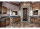 Bathroom offering a walk-in shower, tile flooring, and double vanity sinks at 297 Collegiate Dr, Powder Springs, GA 30127