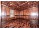 Office featuring wood paneled walls, coffered ceiling and hardwood floors at 297 Collegiate Dr, Powder Springs, GA 30127