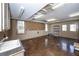Utility room with sink, overhead lighting, and shelving space for storage needs at 297 Collegiate Dr, Powder Springs, GA 30127