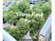 Enjoy the lush greenery of Tower Place Park from this condo balcony, a peaceful retreat in the city at 3338 Peachtree Ne Rd # 1507, Atlanta, GA 30326