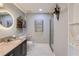 Sleek bathroom featuring granite counters, heated towel rack and glass-enclosed shower at 3338 Peachtree Ne Rd # 1507, Atlanta, GA 30326