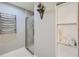 Contemporary bathroom with frameless shower, heated towel rack, and custom storage at 3338 Peachtree Ne Rd # 1507, Atlanta, GA 30326
