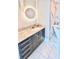 Elegant bathroom with sleek vanity, marble countertops, and modern mirror at 3338 Peachtree Ne Rd # 1507, Atlanta, GA 30326