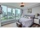 Bedroom with cityscape views, offering natural light and modern comfort at 3338 Peachtree Ne Rd # 1507, Atlanta, GA 30326