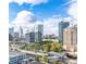 A breathtaking city view of modern buildings, clear skies, and lush greenery at 3338 Peachtree Ne Rd # 1507, Atlanta, GA 30326