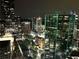 A nighttime cityscape view featuring illuminated buildings at 3338 Peachtree Ne Rd # 1507, Atlanta, GA 30326