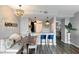 Charming dining area with bench seating and modern lighting fixtures at 3338 Peachtree Ne Rd # 1507, Atlanta, GA 30326
