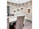 Unique dining room featuring exposed brick walls and modern tile flooring at 3338 Peachtree Ne Rd # 1507, Atlanta, GA 30326