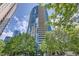 Stunning high-rise condo building with modern architecture and lush landscaping at 3338 Peachtree Ne Rd # 1507, Atlanta, GA 30326