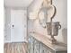 Hallway featuring a decorative sideboard with lamps and a stylish mirror at 3338 Peachtree Ne Rd # 1507, Atlanta, GA 30326