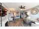 Spacious living room with hardwood floors, an adjacent dining area, and neutral paint at 3338 Peachtree Ne Rd # 1507, Atlanta, GA 30326