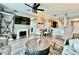 Open-concept living room featuring hardwood floors, fireplace, and modern furniture at 3338 Peachtree Ne Rd # 1507, Atlanta, GA 30326