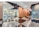 Grand lobby featuring a modern design with checkered floors, wood paneling, and stylish seating at 3338 Peachtree Ne Rd # 1507, Atlanta, GA 30326