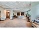 Spacious resident lounge featuring modern seating, built-in shelving, TV, and stylish decor at 3338 Peachtree Ne Rd # 1507, Atlanta, GA 30326