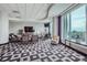 Resident seating area boasts elegant furniture, floor-to-ceiling windows and scenic views at 3338 Peachtree Ne Rd # 1507, Atlanta, GA 30326