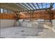 A well-appointed outdoor kitchen with stone accents and a wooden pergola; the perfect spot for hosting at 3338 Peachtree Ne Rd # 1507, Atlanta, GA 30326