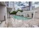 Outdoor pool with lounge chairs and city skyline in the background at 3338 Peachtree Ne Rd # 1507, Atlanta, GA 30326