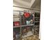 A storage unit secured behind a wire cage with visible items at 3338 Peachtree Ne Rd # 1507, Atlanta, GA 30326