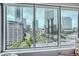 Panoramic city view from a large window, showcasing the urban landscape at 3338 Peachtree Ne Rd # 1507, Atlanta, GA 30326