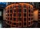 A view of a custom wine cellar with wooden storage and a rolling ladder at 3338 Peachtree Ne Rd # 1507, Atlanta, GA 30326