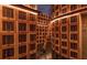 A custom wine cellar with wooden storage and a ladder for upper access at 3338 Peachtree Ne Rd # 1507, Atlanta, GA 30326