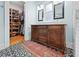 Bathroom featuring a double vanity, patterned floor tiles, and a walk-in closet at 563 Ralph Mcgill Ne Blvd, Atlanta, GA 30312