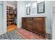 Bathroom featuring a double vanity, patterned floor tiles, and a walk-in closet at 563 Ralph Mcgill Ne Blvd, Atlanta, GA 30312