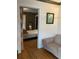 Cozy bedroom with hardwood floors and a comfortable seating area for relaxing at 563 Ralph Mcgill Ne Blvd, Atlanta, GA 30312