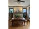Elegant dining room featuring hardwood floors, built-in shelving, and stylish decor at 563 Ralph Mcgill Ne Blvd, Atlanta, GA 30312
