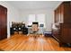 Home office features hardwood flooring, bright windows, and a large armoire at 563 Ralph Mcgill Ne Blvd, Atlanta, GA 30312