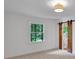 Bedroom with barn door to bathroom and large window at 1610 Old Mill Xing, Marietta, GA 30062